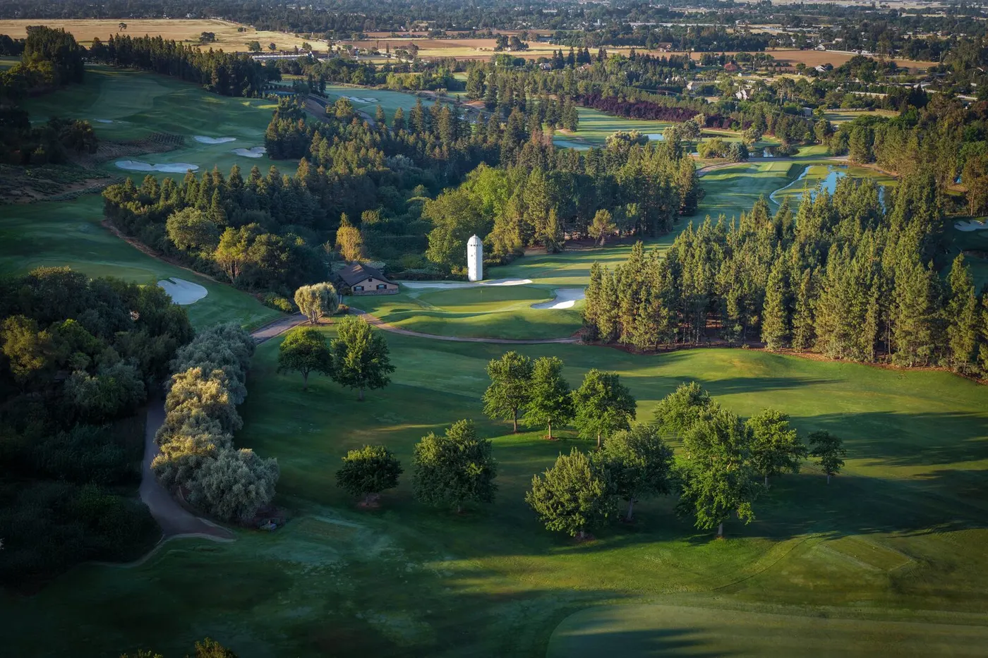 The course from the air, with the silo standing among the fairways